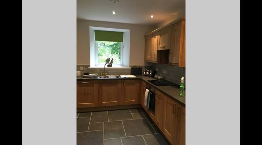 Well equipped kitchen (there is a separate utility with drying facilities)