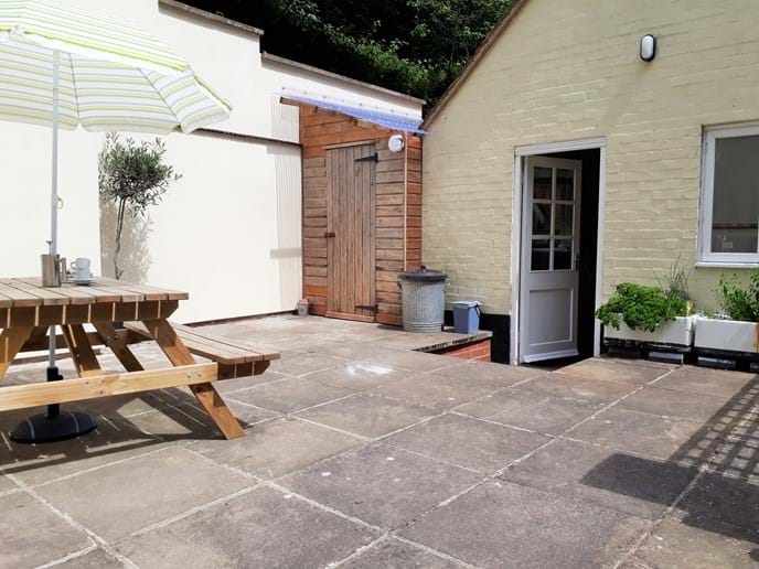 Private enclosed courtyard area at rear of the cottage leading from the kitchen