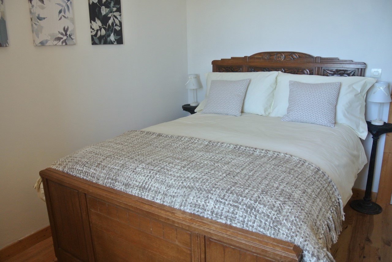 Snuggle down in an antique French bed with luxury mattress topper and Egyptian cotton bedding