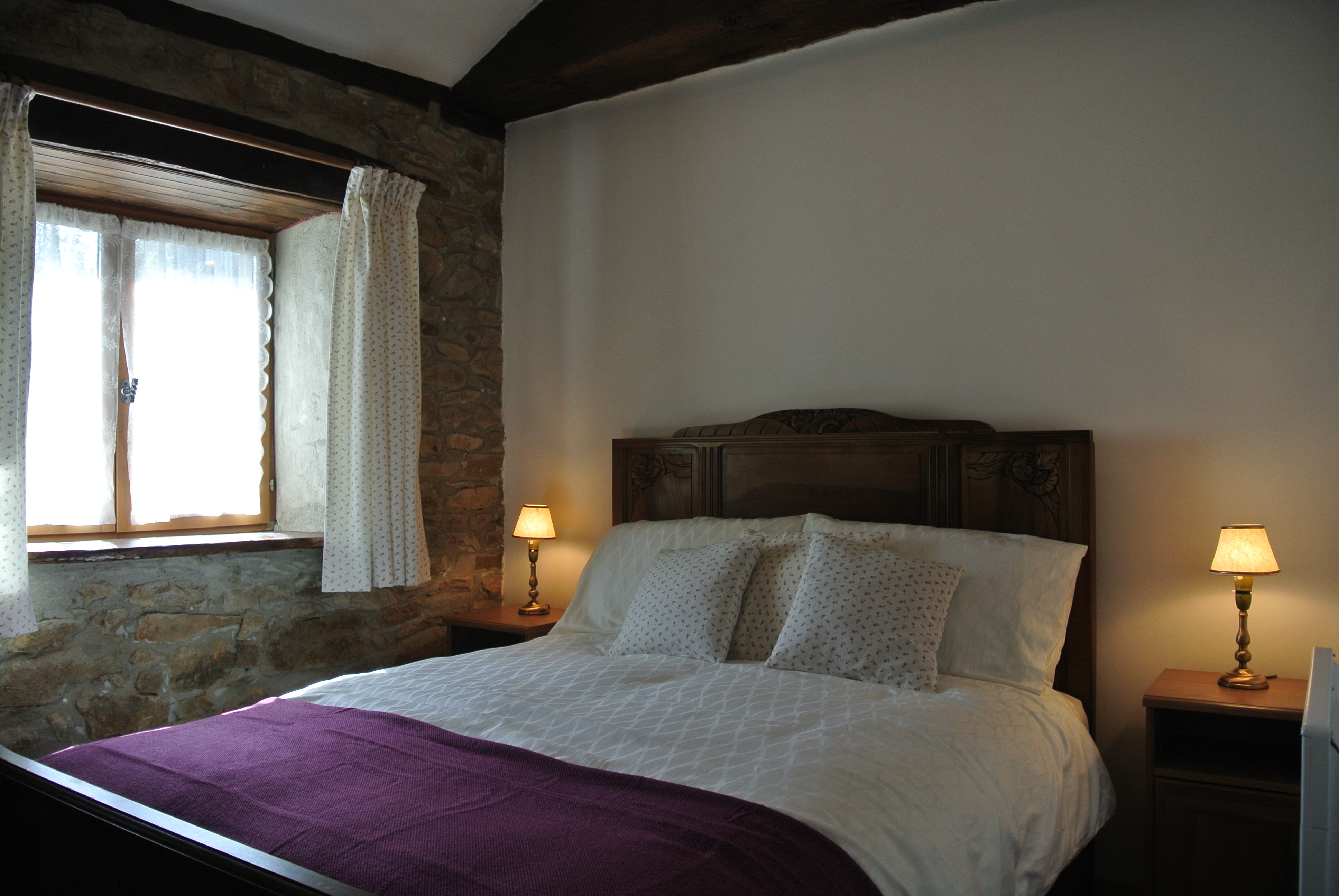 Snuggle down in an antique double bed