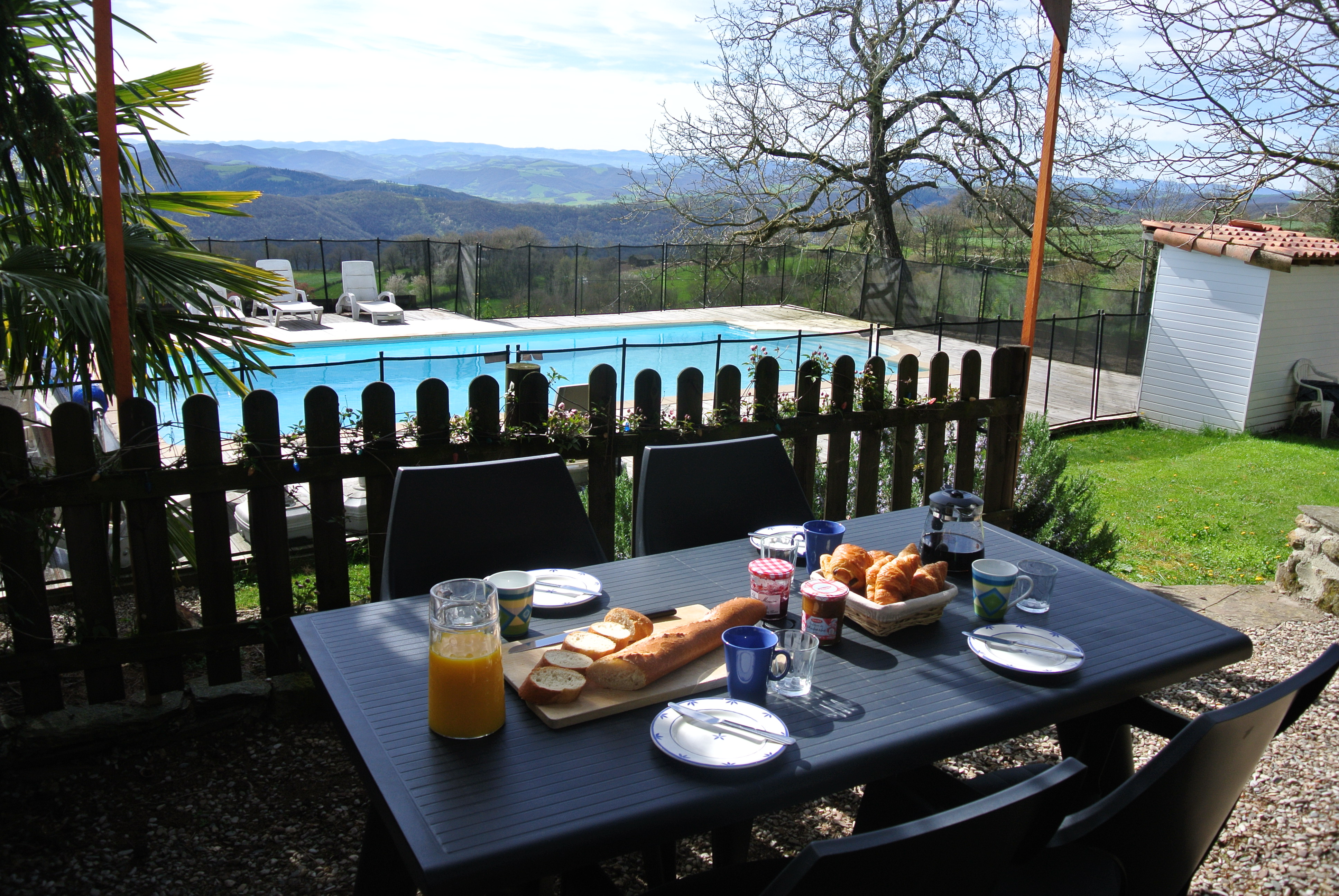 Breakfast on the large terrace overlooking the pool