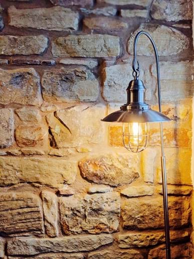 The stone walls give the cottage great character