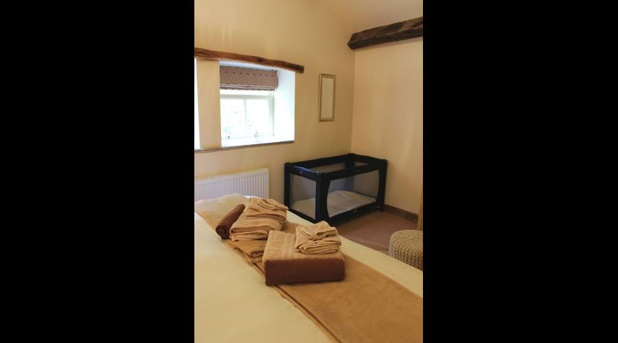 Bedroom 1 with the travel cot