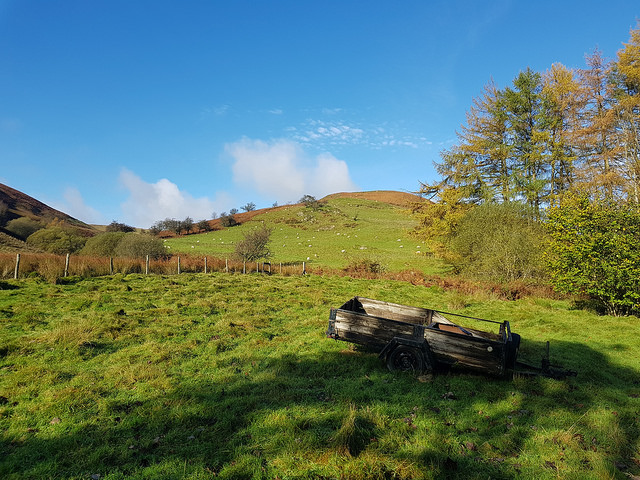 The cottage is surrounded by hills in all directions