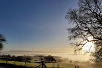 The view on a misty day heading towards Builth Wells