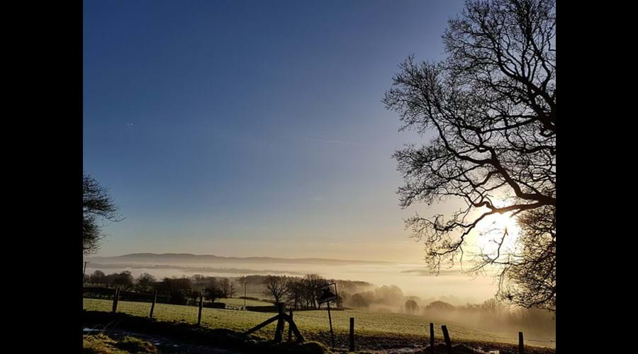 The view on a misty day heading towards Builth Wells