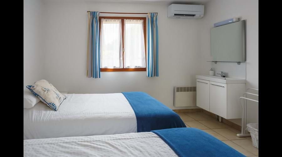 Bedroom two with wash hand basin