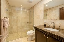 Family bathroom with walk in shower single vanity