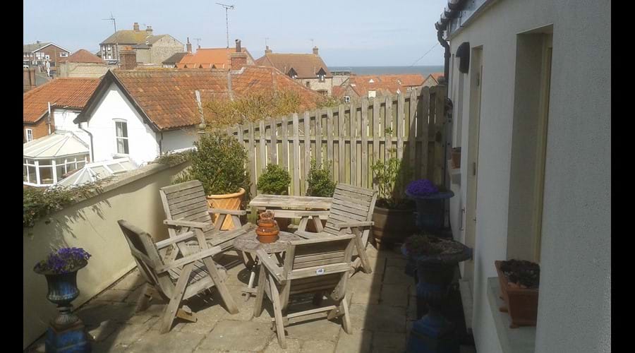 West terrace - outside the main bedroom. Note the "Blackpool landlady" sea view on the horizon!