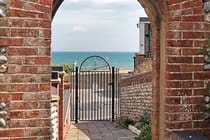 Archway to the Dell and the sea