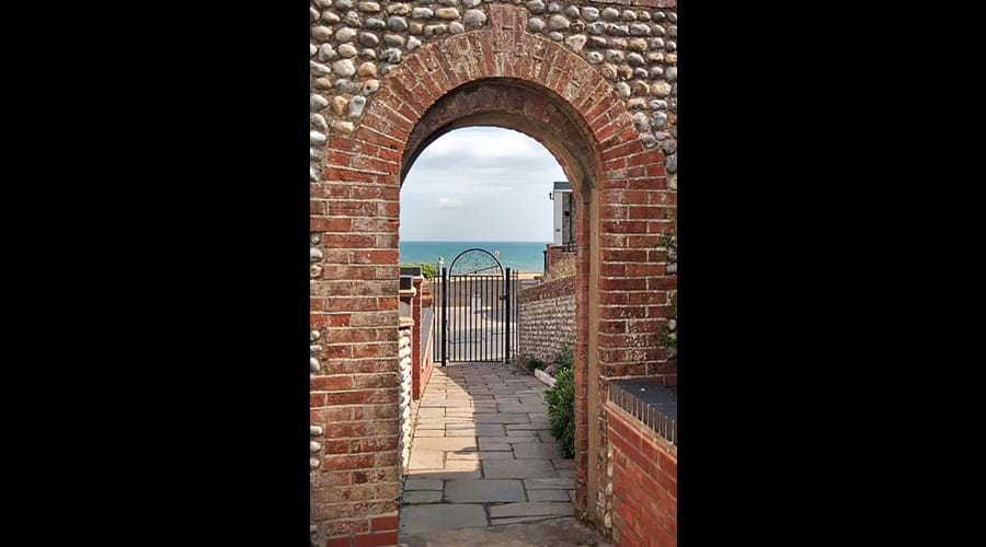 Archway to the Dell and the sea