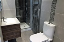 Ensuite to master bedroom with vanity unit & washbasin, led mirror and shaving point, shower cubicle and wc