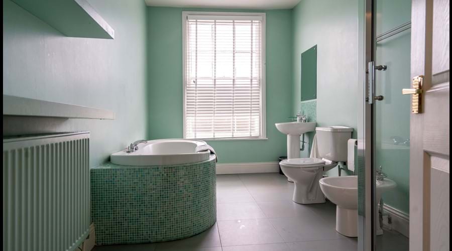 1st Floor Family Bathroom with large shower cubicle, separate bath, washbasin, wc and bidet