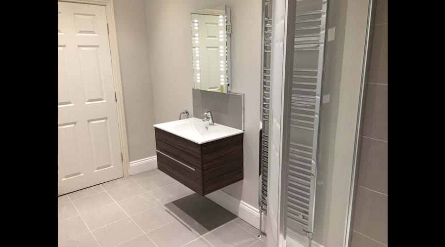 Groundfloor shower room with vanity unit and washbasin
