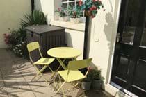 Lower Part of Patio Garden with Bistro Table and Chairs - perfect for morning coffee!