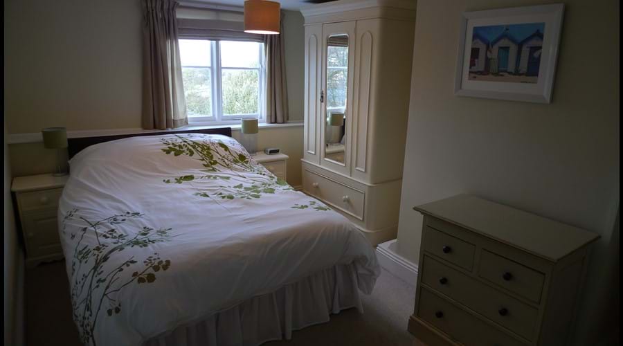 Bedroom 3: Double bed with wardrobe, chest of drawers, dressing table and side tables
