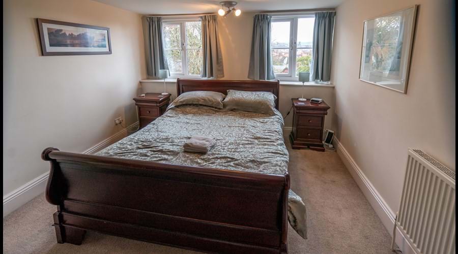 2nd Floor Double Bedroom with king size bed, wardrobe and chest of drawers