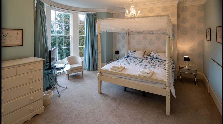 First floor Master Bedroom with superking 4 poster, TV, ensuite shower room.