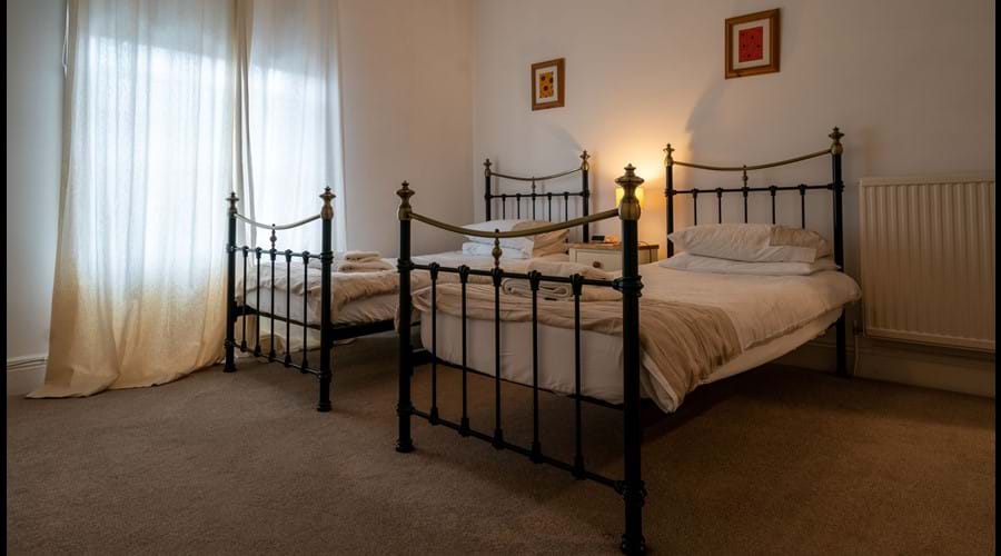 1st floor Twin Room with wardrobe, chest of drawers & full size mirror