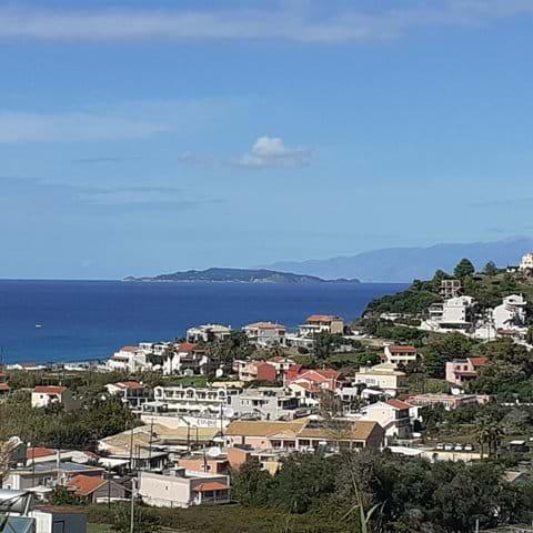 View of Agios Stefanos with Albania in the distance