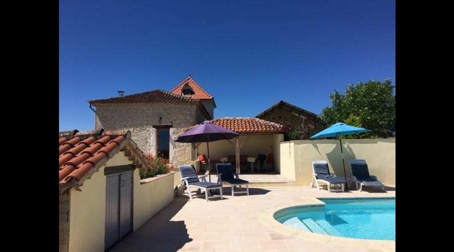 Pool with covered outside dining area