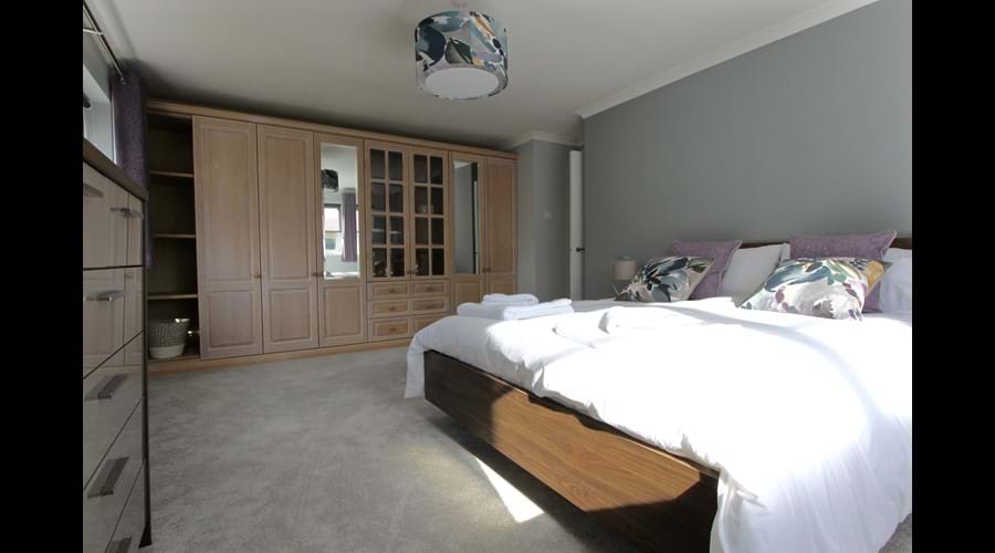 Master bedroom with fitted wardrobes. Freeview TV.