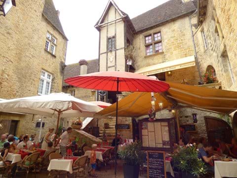 Have lunch al fresco in a medieval courtyard