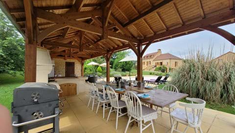 A full stone bbq and another one to help with larger numbers.  A fully shaded dining table for all your group