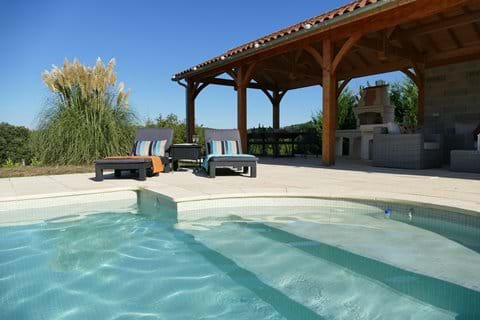 Superb pool 11m x 5m with Roman steps and rattan loungers