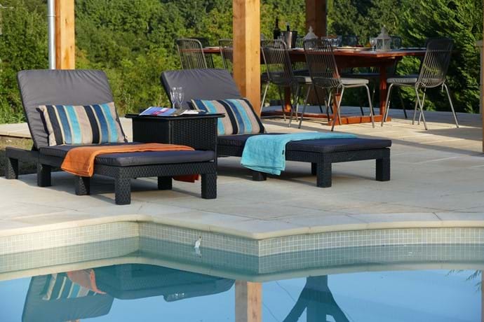 All weather rattan loungers around the pool