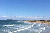 The wide sand arc of Portrush