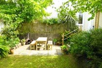Our "secret" garden offers privacy along with a picnic table and bbq