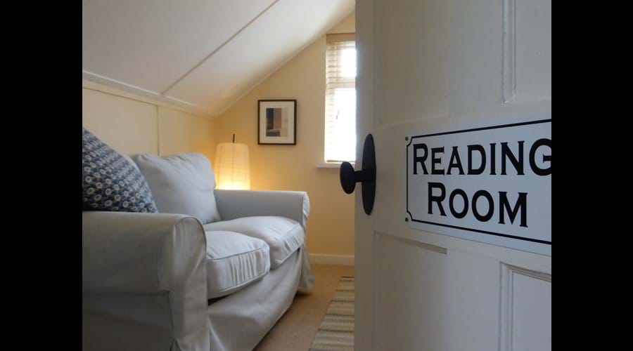 Relax with a book - or your tablet - in our upstairs Reading Room