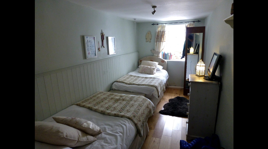 situated next door to the shower room and toilet