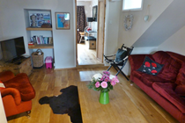 Living room, there are books and DVD