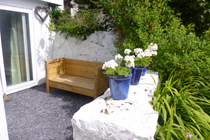 Outside the kitchen door ...to sit here with your morning coffee....bliss