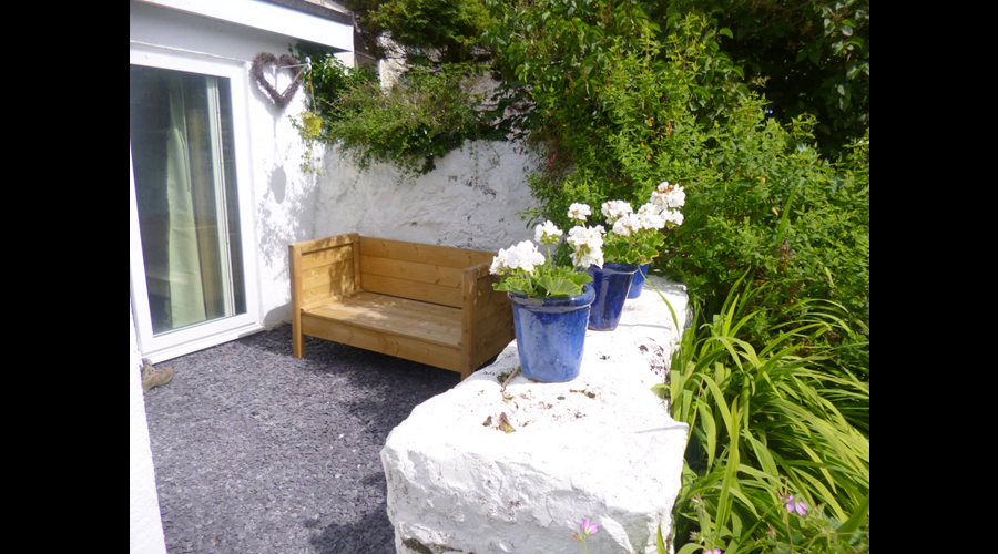 Outside the kitchen door ...to sit here with your morning coffee....bliss