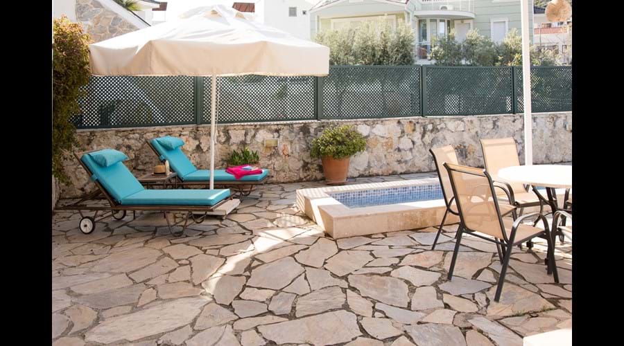 Relax in the shade with a cold drink and a good book