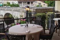 Dining by the river in Brantome