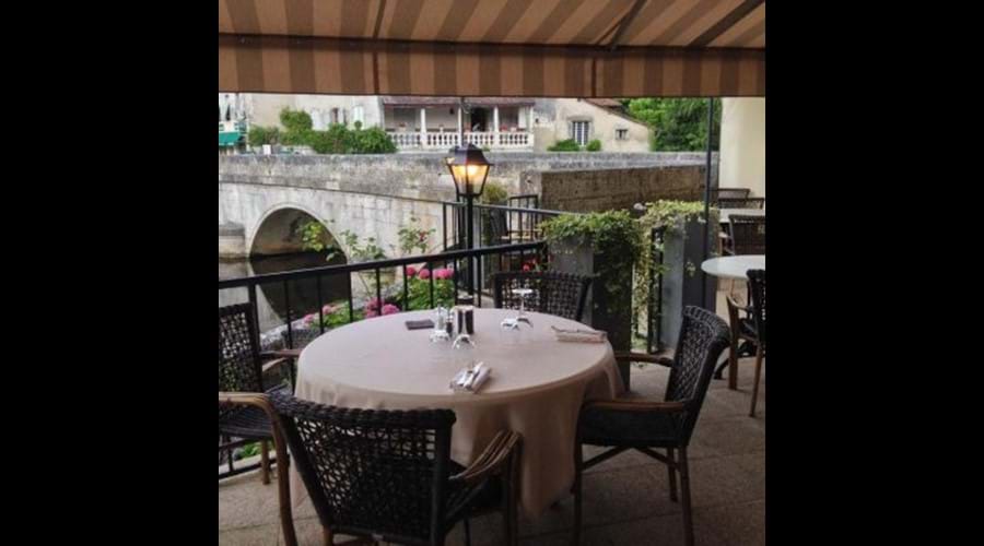 Dining by the river in Brantome