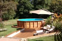 Woods and the river are the ideal backdrop to the pool in River View Cottage