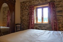 One of the comfortable beds in River View Cottage