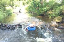 Build a dam and shoot the rapids