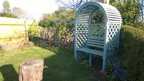 Why not take a good book and relax at the end of the garden