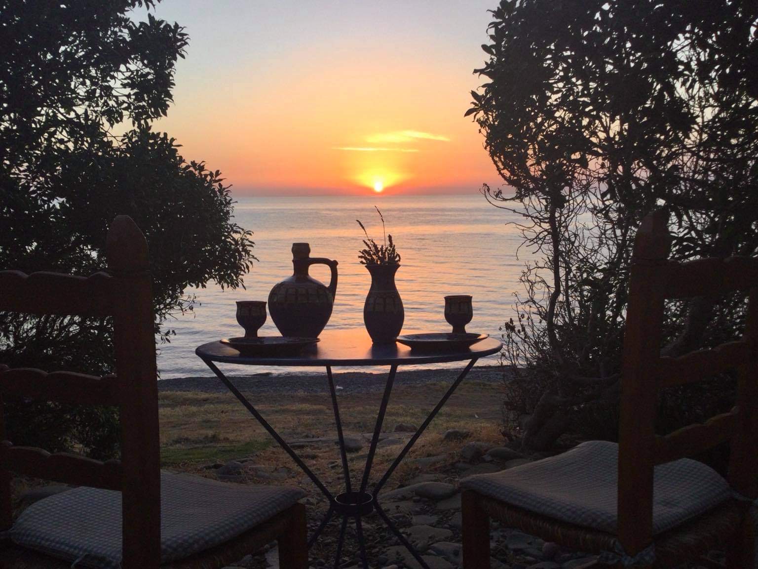 A carafe of wine watching the sunset at Shambala