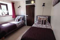 Twin bedroom with en-suite shower room.