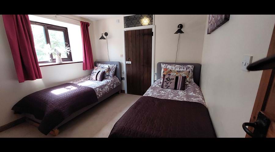 Twin bedroom with en-suite shower room.