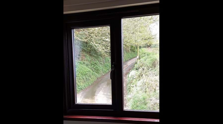 View from double bedroom onto a quiet single track lane