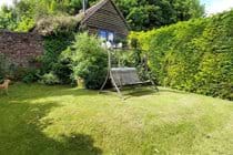 The gardens are private and well fenced, with hedges and stock proof wire fencing.