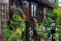 Front garden with off road parking right by the garden gate